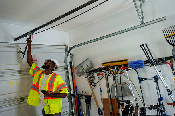 Professional Garage Door Panel Replacement technician working in Albion, NY